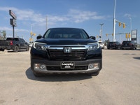 2019 Honda Ridgeline Touring AWD – Luxury, Capability & Reliability Loeppky Auto Sales is proud to o... (image 7)