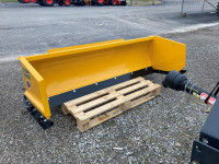 CQM compact snow pushers with skid steer attachment