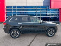 The odometer is 62 093 kilometers below market average! Diamond Black Crystal Pearl 2018 Jeep Grand... (image 6)