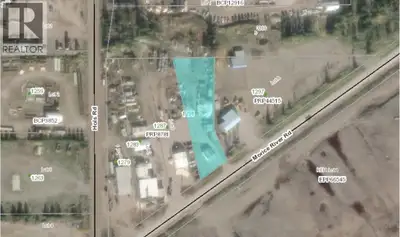 1.95 acres of Industrial zoned land located in Houston BC on Morice River Rd. Small shop on property...
