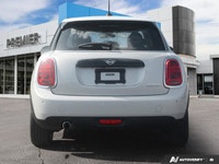 Navigate city streets with playful confidence and undeniable style in this 2021 MINI 5 Door Cooper H... (image 4)