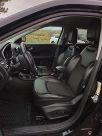 Step into the commanding presence of the 2018 Jeep Compass Altitude 4x4, cloaked in a stunning black... (image 8)