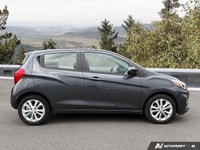 Navigate urban streets with ease and surprising efficiency in this 2021 Chevrolet Spark 1LT Hatchbac... (image 5)