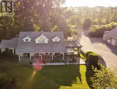 Featuring 12.65 acres, this beautiful, manicured & well-treed acreage is located within 10km of Swif...