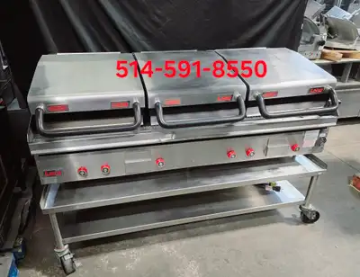 Lang Clamshell ribbed top 72" gas griddle. Comes with 3 infra-red press and mobile equipment stand....