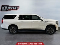 The 2025 GMC Yukon XL Elevation 4WD commands attention with extended-length presence, bold monochrom... (image 5)