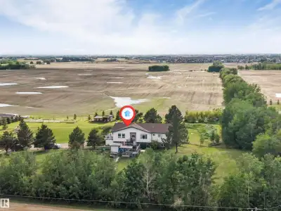 Country Living with City Convenience! Spacious walkout bi-level on 3 acres in a prime location, minu...