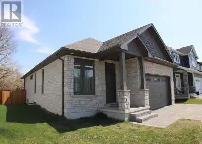 Previous model home of Tandem Building Contractors, Spacious open concept design with engineered har...