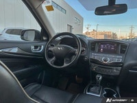 Experience refined comfort and confident all-wheel-drive performance with the *2018 INFINITI QX60 AW... (image 9)