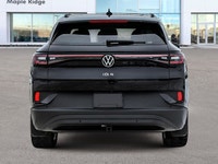 The 2025 Volkswagen ID.4 Pro AWD in striking Deep Black Pearl stands as a beacon of modern engineeri... (image 5)