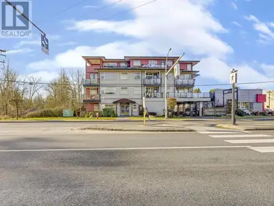 This charming home offers a modern, spacious & open layout with 9' high ceilings and abundant natura...