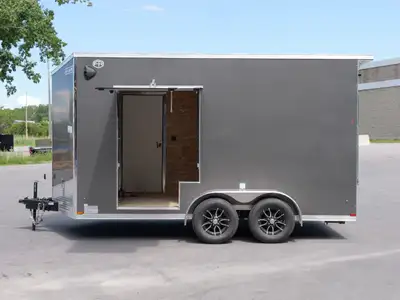 2027 HAULIN 7x14 Tandem Axle Enclosed Trailer with UTV Escape Door Financing Available From $98.43*...