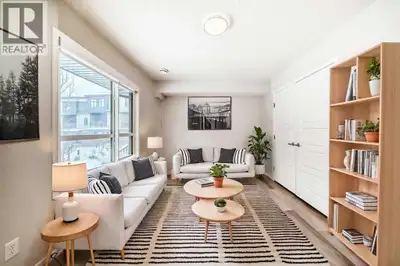 Fronting onto a beautifully landscaped courtyard, this exceptional 3-bedroom + 2-den townhome by awa...