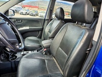 Experience the reliable and versatile 2007 Kia Sportage in a stunning blue finish with front-wheel d... (image 9)