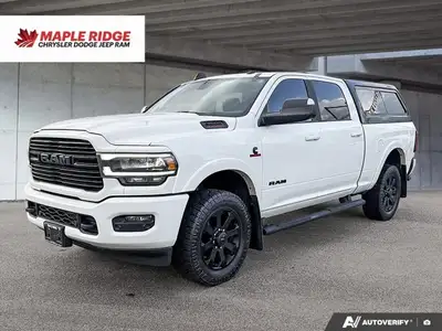Equipped for serious towing and supreme comfort, this 2020 Ram 3500 Crew Cab Laramie in stunning Pea...