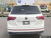 This Volkswagen Tiguan delivers a Intercooled Turbo Regular Unleaded I-4 2.0 L/121 engine powering t... (image 3)