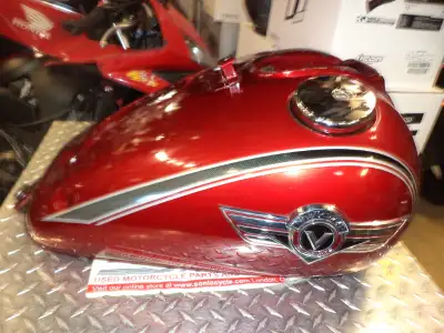 sonic cycle has a 2003 kawasaki vn -800 vulcan gas tank very nice shape $400.00 shipping available ....
