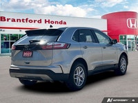Command the road and embrace adventure in this sophisticated 2023 Ford Edge SEL, striking in Silver.... (image 5)