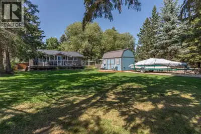 Discover your ultimate four-season retreat at the southern tip of Pigeon Lake in the summer village...