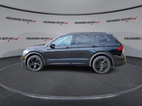 This Volkswagen Tiguan has a strong Turbo Gas 4cyl 2.0 L engine powering this Automatic transmission... (image 4)