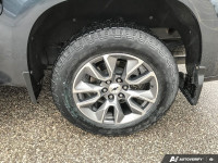 Experience rugged power and refined comfort with this 2021 Chevrolet Silverado 1500 RST. This lightl... (image 6)