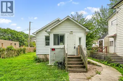 Step into the enclosed porch at 1016 Hickory, a bright spot to enjoy your morning coffee. Inside, th...
