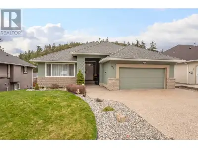 Welcome to this beautifully updated and spacious 5-bedroom rancher with a walkout basement in desira...