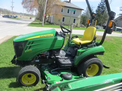 like new; only 151 hours; diesel; 4x4; mid and rear PTO; 3 pth; 60" auto connect mower like new; loc...