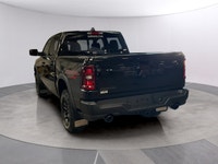 Experience the 2027 Ram 1500 Rebel in stunning black with robust 44 capabilities. This new truck del... (image 2)