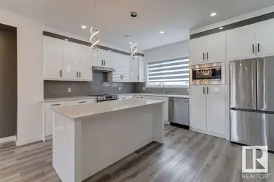 You can have it all! Live your life in style in this modern, luxurious, quality built townhome, feat...
