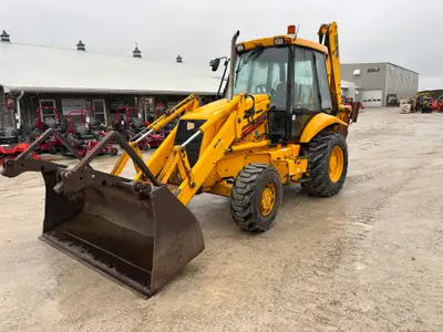 Iron Inventory Inc! 1999 JCB 214 Back hoe is powered by a Perkins 84hp diesel engine. Enclosed heate...