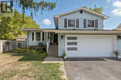 Welcome to your next home a delightful 4-level side split nestledon a tranquil, tree-lined street. T...