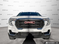 Experience the capable performance of the 2024 GMC Terrain SLE, a striking white Sport Utility ready... (image 9)