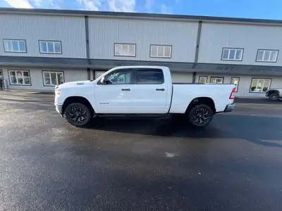 The 2021 Ram 1500 Tradesman in a stunning white finish offers impressive 4x4 capabilities for incred...