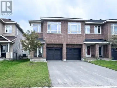 Welcome to 222 Hooper Street, a spacious end-unit townhouse located in the vibrant and growing Carle...