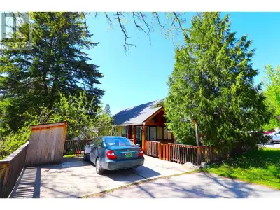 Investor Alert! Newly Renovated Downtown Home with Basement Suite, Hot Tub, & Subdivision Potential!...