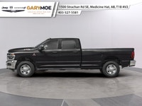 The 2026 Ram 3500 Tradesman Trim 4x4 Crew Cab 8 Box is a commanding presence with its bold Black ext... (image 2)