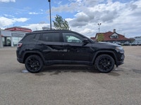 The 2026 Jeep Compass North in Diamond Black Crystal Pearl with a Black interior combines bold style... (image 7)