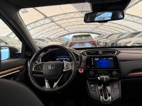 The 2019 Honda CR-V EX-L AWD is a highly practical, mid-tier premium compact crossover that serves a... (image 9)
