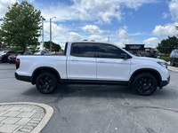 Command the road with this stunning 2024 Honda Ridgeline Black Edition Crew Cab Pickup. This Certifi... (image 3)