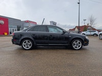 This pre-owned 2008 Audi A4 2.0T offers a timeless design with a sleek black exterior paired with a... (image 7)