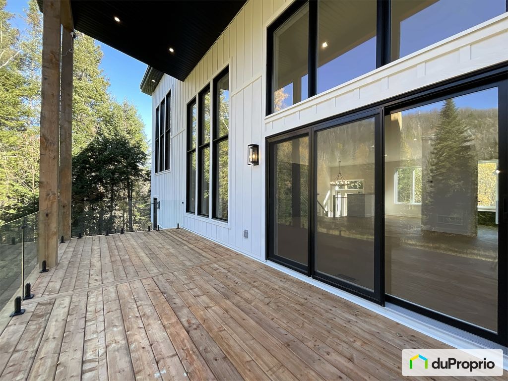 $1,099,000 - Bungalow for sale in Ste-Adele — photo 1