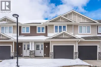 Beautiful fully developed 2-storey townhouse in sought-after Kensington featuring 3 bedrooms, 4 bath...