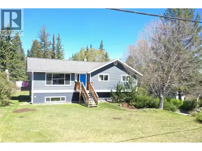 This four-bedroom, three-bathroom home in the Red Bluff area sits on just over an acre of private, b...