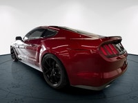The 2016 Ford Mustang GT in vibrant red with a rear-wheel-drive setup promises dynamic handling and... (image 8)