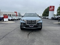 This 2024 Hyundai Santa Cruz Trend boasts a powerful turbocharged engine and stylish Blue Stone exte... (image 1)