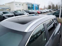 Exterior Highlights Exclusive blacked-out styling: dark chrome V-Motion grille, black mirror caps, b... (image 6)