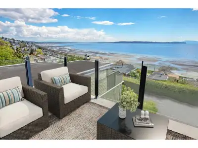 Panoramic ocean views spanning 180 degrees, no wires & majestic Mount Baker views East. An exception...