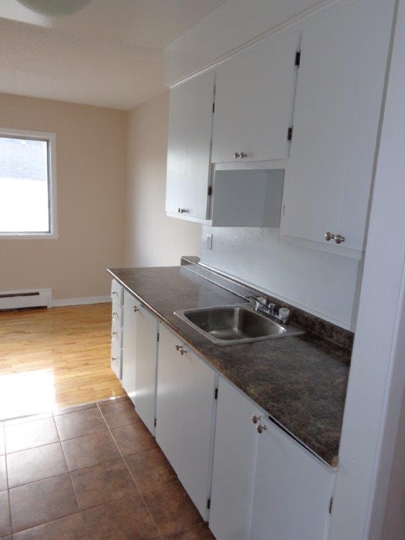 Golden Equity Properties at 353,355,357,359,370 McArthur ave Long