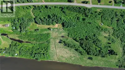 Morning Coffee just got better, living on the Tobique! Beautiful WATERFRONT 20+ acre parcel of land...